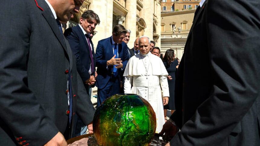 Pope Leo XIV receives 'symbolic sphere in charity's push for AI to 'protect human dignity'